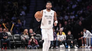 Jan 28, 2023; Brooklyn, New York, USA;  Brooklyn Nets guard Kyrie Irving (11) brings the ball up court in the third quarter against the New York Knicks at Barclays Center. Mandatory Credit: Wendell Cruz-Imagn Images