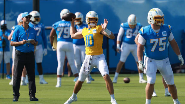 Los Angeles Chargers quarterback Justin Herbert (10) throws during the first day of training camp at The Bolt.