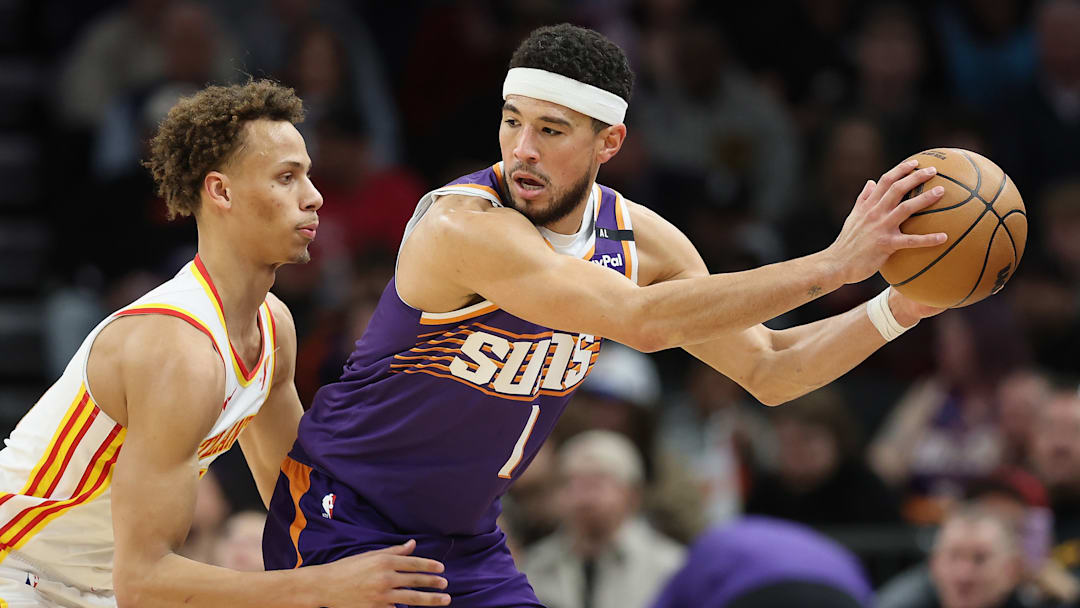 Devin Booker and the Phoenix Suns look to extend a five-game winning streak against the Atlanta Hawks.