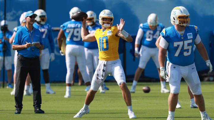 Jul 24, 2024; El Segundo, CA, USA;  Los Angeles Chargers quarterback Justin Herbert (10) throws during the first day of training camp at The Bolt.