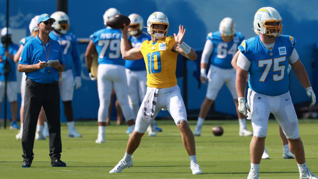 Jul 24, 2024; El Segundo, CA, USA;  Los Angeles Chargers quarterback Justin Herbert (10) throws