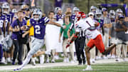 Sep 13, 2024; Manhattan, Kansas, USA; Kansas State Wildcats quarterback Avery Johnson (2) is forced out of bounds by Arizona Wildcats defensive back Tacario Davis (1) during the third quarter at Bill Snyder Family Football Stadium.