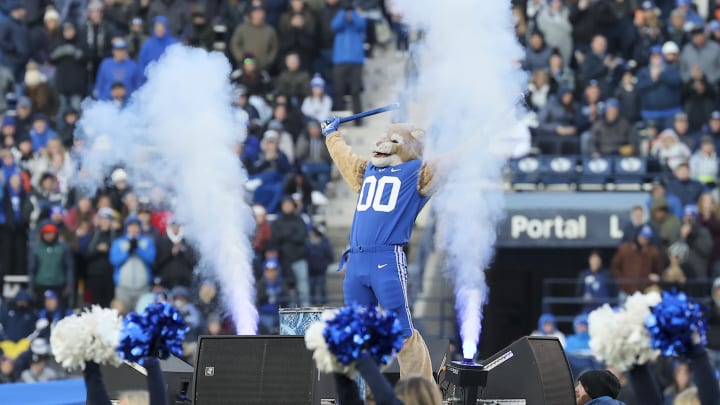 Nov 19, 2022; Provo, Utah, USA; Cosmo the Brigham Young Cougars mascot encourages the fans against the Utah Tech Trailblazers between the third and fourth quarters at LaVell Edwards Stadium.