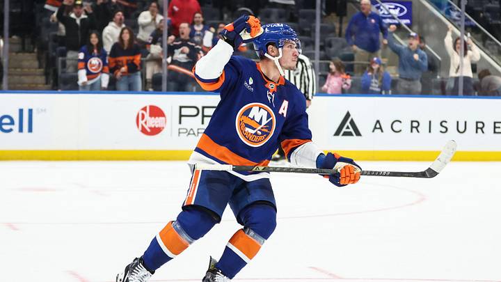 Nov 23, 2025; Elmont, New York, USA;  New York Islanders center Bo Horvat (14) celebrates after scoring a goal during a shootout in overtime against the Seattle Kraken at UBS Arena. Mandatory Credit: Wendell Cruz-Imagn Images