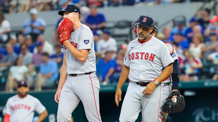 Aug 4, 2024; Arlington, Texas, USA;  Boston Red Sox starting pitcher Nick Pivetta (37) speaks with Boston Red Sox manager Alex Cora (13) during the second inning against the Texas Rangers at Globe Life Field. Mandatory Credit: Kevin Jairaj-USA TODAY Sports