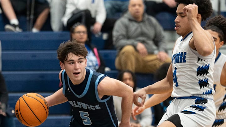 Feb 26, 2025; Waldwick, New Jersey, United States; Hawthorne boys basketball at Waldwick. W #5 Andrew Del Rey and H #4 Pablo Gonzalez.