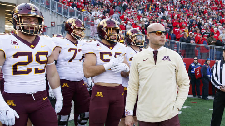 Minnesota coach P.J. Fleck stands before a game against Wisconsin at Camp Randall Stadium in Madison, Wis., on Nov. 26, 2022.