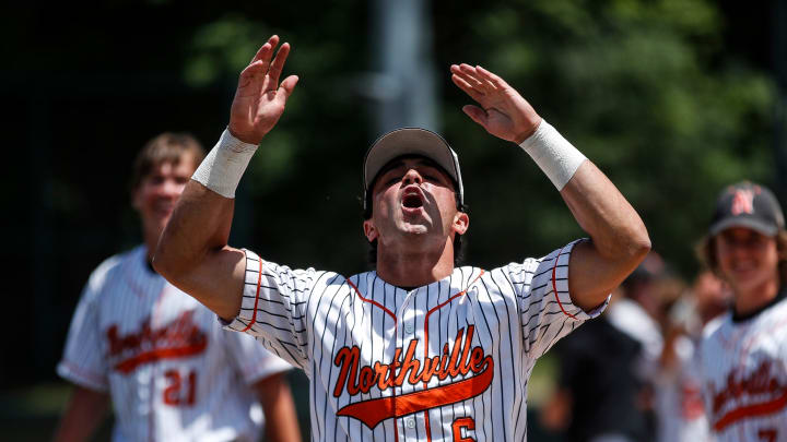 Northville center fielder Dante Nori celebrates 2-1 win over Birmingham Brother Rice during MHSAA Division 1 baseball final at McLane Baseball Stadium in East Lansing on Saturday, June 15, 2024.