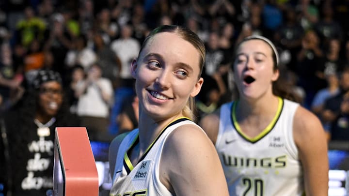 Sep 11, 2025; Arlington, Texas, USA; Dallas Wings guard Paige Bueckers (5) smiles after the game against the Phoenix Mercury at College Park Center. Mandatory Credit: Jerome Miron-Imagn Images Sep 11, 2025; Arlington, Texas, USA; Dallas Wings guard Paige Bueckers (5) smiles after the game against the Phoenix Mercury at College Park Center. Mandatory Credit: Jerome Miron-Imagn Images