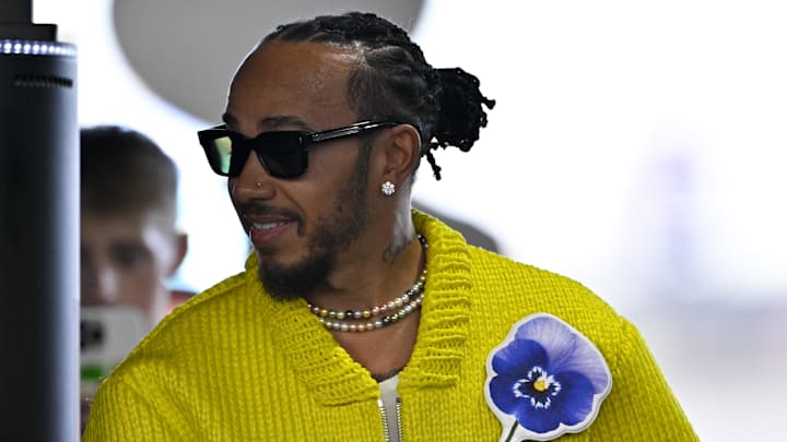 Oct 20, 2024; Austin, Texas, USA; Mercedes AMG Petronas F1 Team driver Lewis Hamilton (44) of Team Great Britain walks through the track entrance before the 2024 Formula One US Grand Prix at Circuit of the Americas. Mandatory Credit: Jerome Miron-Imagn Images