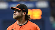 Baltimore Orioles starting pitcher Corbin Burnes walks off the field after the third inning against the Tampa Bay Rays at Tropicana Field on August 10, 2024. 