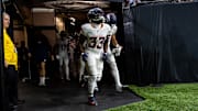 Denver Broncos running back Javonte Williams runs out the tunnel before the game against the New Orleans Saints.