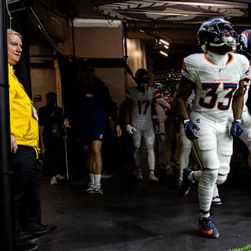 Denver Broncos running back Javonte Williams runs out the tunnel before the game against the New Orleans Saints.