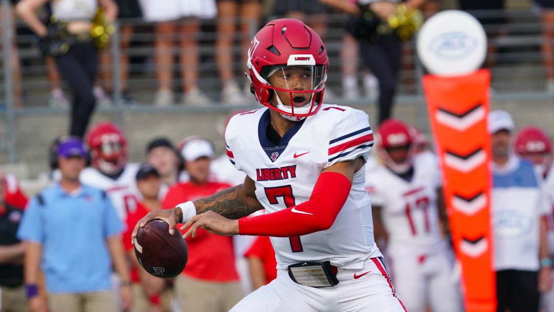 Sep 17, 2022; Winston-Salem, North Carolina, USA;  Liberty Flames quarterback Kaidon Salter (7) gets ready to throw the ball against the Wake Forest Demon Deacons during the first half at Truist Field. Mandatory Credit: James Guillory-USA TODAY Sports