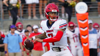 Sep 17, 2022; Winston-Salem, North Carolina, USA;  Liberty Flames quarterback Kaidon Salter (7) gets ready to throw the ball against the Wake Forest Demon Deacons during the first half at Truist Field. Mandatory Credit: James Guillory-USA TODAY Sports