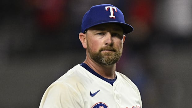 Texas Rangers closer Kirby Yates earned his 31st save with a perfect, two-strikeout ninth against the Toronto Blue Jays.