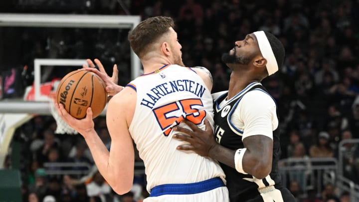 Apr 7, 2024; Milwaukee, Wisconsin, USA; Milwaukee Bucks forward Bobby Portis (9) plays defense against New York Knicks center Isaiah Hartenstein (55) in the second half at Fiserv Forum. Mandatory Credit: Michael McLoone-USA TODAY Sports