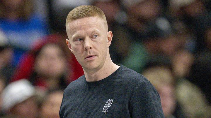 Feb 5, 2026; Dallas, Texas, USA; San Antonio Spurs assistant coach Sean Sweeney looks on during the game between the Mavericks and the Spurs at the American Airlines Center. Mandatory Credit: Jerome Miron-Imagn Images