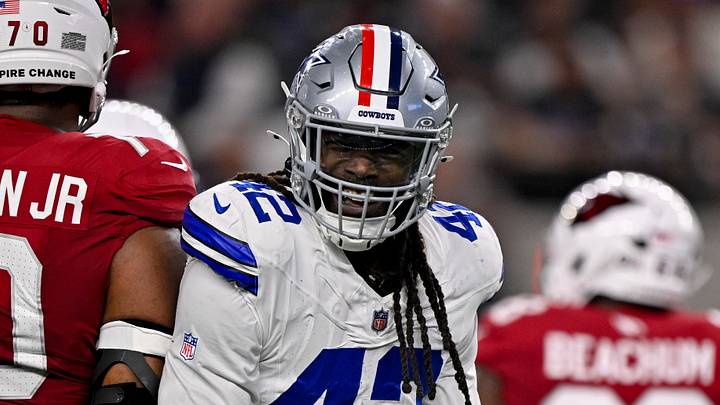 Nov 3, 2025; Arlington, Texas, USA; Dallas Cowboys defensive end Jadeveon Clowney (42) celebrates after he sacks Arizona Cardinals quarterback Jacoby Brissett (7) during the game between the Dallas Cowboys and the Arizona Cardinals at AT&T Stadium. Mandatory Credit: Jerome Miron-Imagn Images
