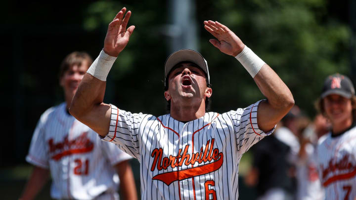 Northville center fielder Dante Nori celebrates 2-1 win over Birmingham Brother Rice during MHSAA Division 1 baseball final at McLane Baseball Stadium in East Lansing on Saturday, June 15, 2024.