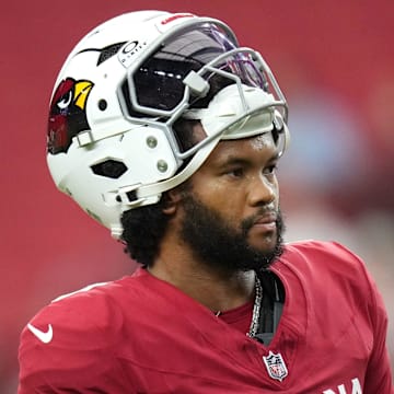 Aug 9, 2025; Glendale, Ariz, U.S.; Arizona Cardinals quarterback Kyler Murray (1) walks the field before their preseason game against the Kansas City Chiefs at State Farm Stadium on Aug. 9, 2025.