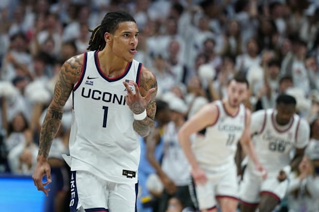 UConn guard Solo Ball reacts after his three-point basket against Marquette.