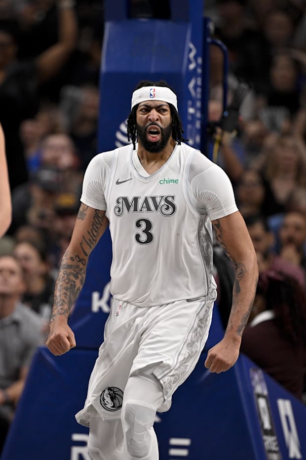 Dallas Mavericks forward Anthony Davis (3) celebrates after he dunks the ball 