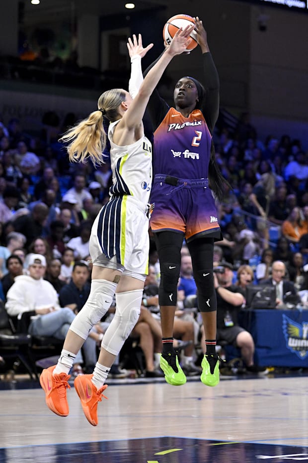 Phoenix Mercury guard Kahleah Copper shoots the ball over Dallas Wings guard Paige Bueckers