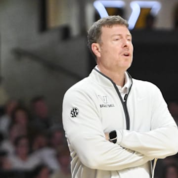 Nov 15, 2025; Nashville, Tennessee, USA;  Vanderbilt Commodores head coach Mark Byington watches his team against the Arkansas-Pine Bluff Golden Lions during the first half at Memorial Gymnasium. Mandatory Credit: Steve Roberts-Imagn Images