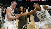 Mar 5, 2025; Boston, Massachusetts, USA; After scoring a career high 43 points, Boston Celtics guard Payton Pritchard (11) has a laugh with center Al Horford (42) after their win over the Portland Trail Blazers at TD Garden. Mandatory Credit: Winslow Townson-Imagn Images
