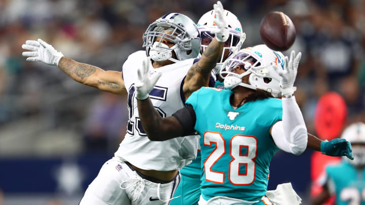 Sep 22, 2019; Arlington, TX, USA; Dallas Cowboys receiver Devin Smith (15) can not make the catch in the second quarter against Miami Dolphins safety Bobby McCain (28) at AT&T Stadium.