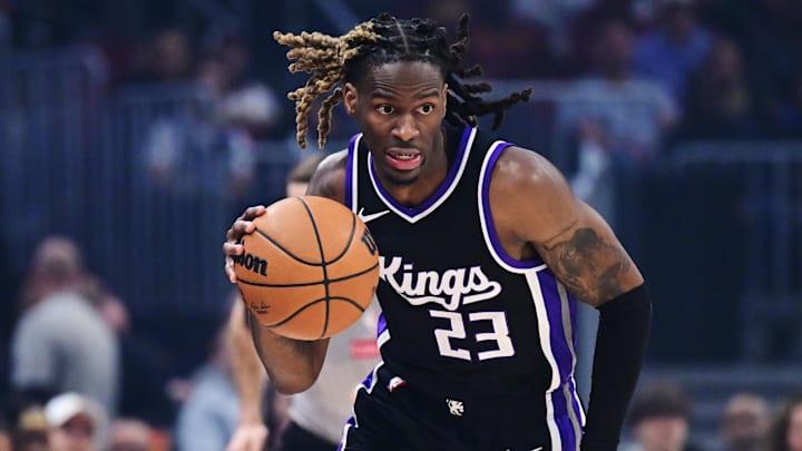 Apr 6, 2025; Cleveland, Ohio, USA; Sacramento Kings guard Keon Ellis (23) brings the ball up court during the first quarter against the Cleveland Cavaliers at Rocket Arena. Mandatory Credit: Ken Blaze-Imagn Images