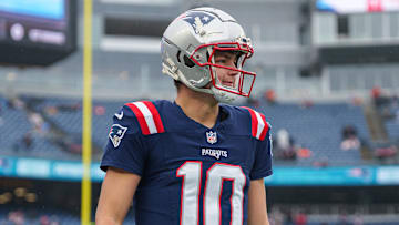 Dec 28, 2024; Foxborough, Massachusetts, USA; New England Patriots quarterback Drake Maye (10) warms up before the start of the game against the Los Angeles Chargers at Gillette Stadium. Mandatory Credit: David Butler II-Imagn Images