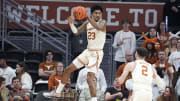 Feb 19, 2024; Austin, Texas, USA; Texas Longhorns forward Dillon Mitchell (23) saves the ball from going out of bounds during the second half against the Kansas State Wildcats at Moody Center. Mandatory Credit: Scott Wachter-USA TODAY Sports