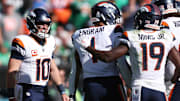 Oct 5, 2025; Philadelphia, Pennsylvania, USA; Denver Broncos tight end Evan Engram (1) celebrates with quarterback Bo Nix (10) and wide receiver Marvin Mims Jr. (19) after scoring a touchdown against the Philadelphia Eagles in the second half at Lincoln Financial Field. 
