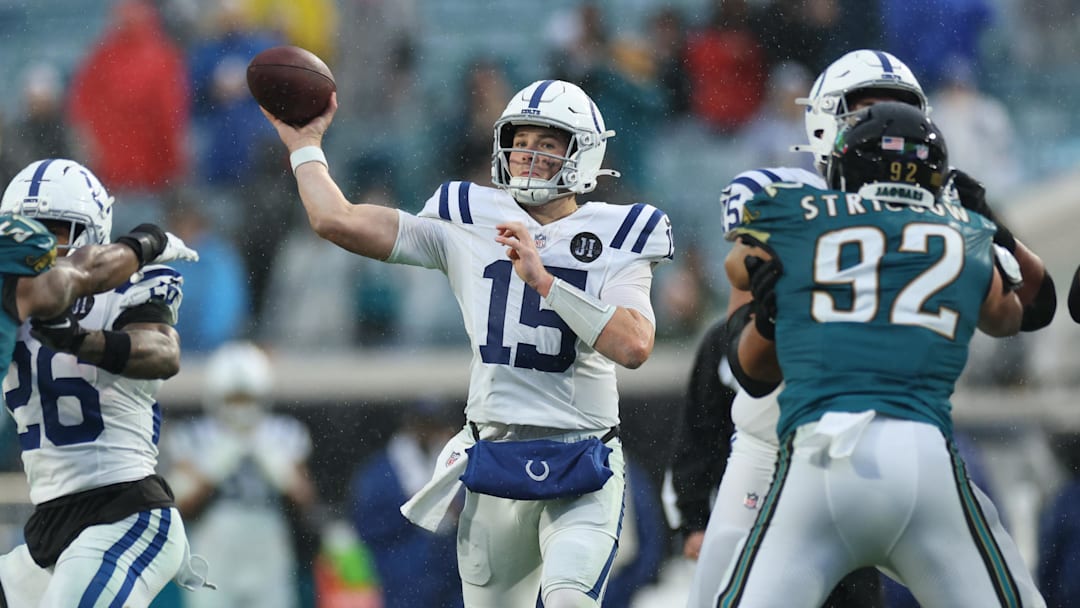 Dec 7, 2025; Jacksonville, Florida, USA;  Indianapolis Colts quarterback Riley Leonard (15) throws downfield against the Jacksonville Jaguars during the second half at EverBank Stadium. 