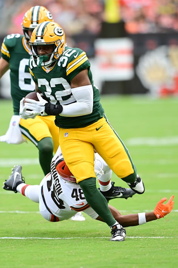 Green Bay Packers running back MarShawn Lloyd (32) runs with the ball against the Cleveland Browns in the preseason.