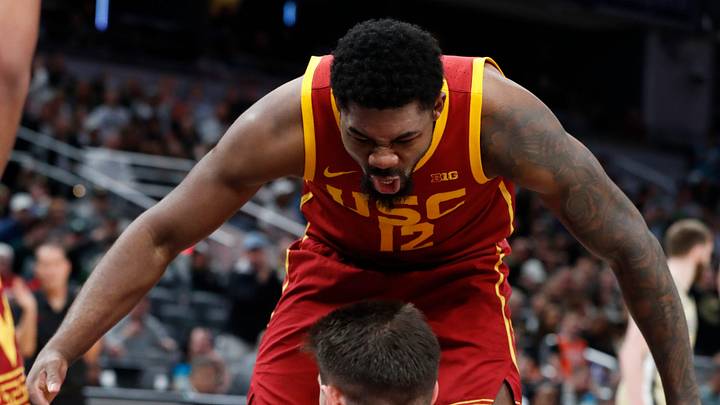 USC Trojans forward Rashaun Agee (12) celebrates after USC Trojans forward Josh Cohen (33) draws a foul on Purdue Boilermakers forward Trey Kaufman-Renn (4) Thursday, March 13, 2025, during the Big Ten Men’s Basketball Tournament game at Gainbridge Fieldhouse in Indianapolis.
