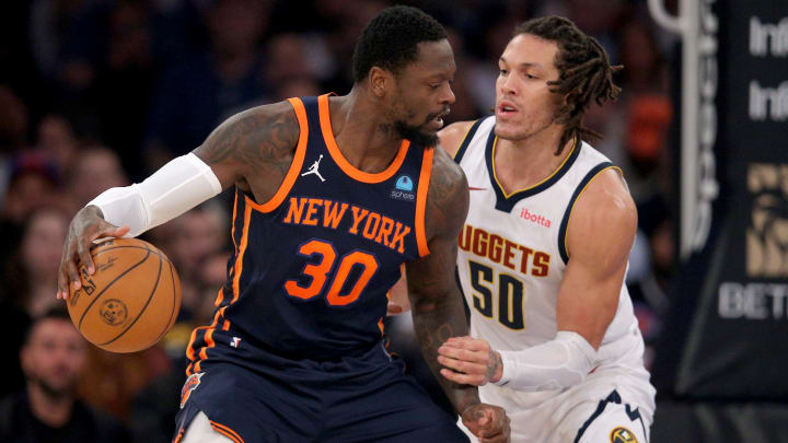 Jan 25, 2024; New York, New York, USA; New York Knicks forward Julius Randle (30) controls the ball against Denver Nuggets forward Aaron Gordon (50) during the first quarter at Madison Square Garden. Mandatory Credit: Brad Penner-USA TODAY Sports