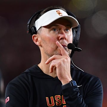 Nov 7, 2025; Los Angeles, California, USA; Southern California Trojans head coach Lincoln Riley watches game action against the Northwestern Wildcats during the second half at the Los Angeles Memorial Coliseum. Mandatory Credit: Gary A. Vasquez-Imagn Images