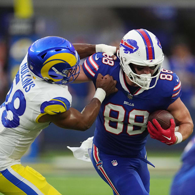 linebacker Justin Hollins (58) pursues tight end Dawson Knox (88)