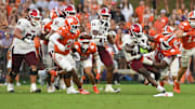 Troy Trojans running back Tae Meadows (22) rushes the ball Saturday, Sept. 6, 2025 during the NCAA football game against the Clemson Tigers at Memorial Stadium in Clemson, South Carolina.