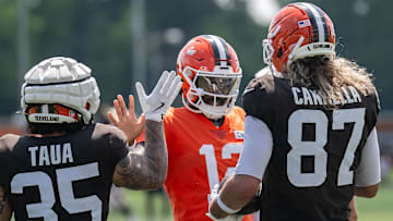 Cleveland Browns TE Sal Cannella celebrates with rookie Shedeur Sanders after a touchdown during NFL training camp