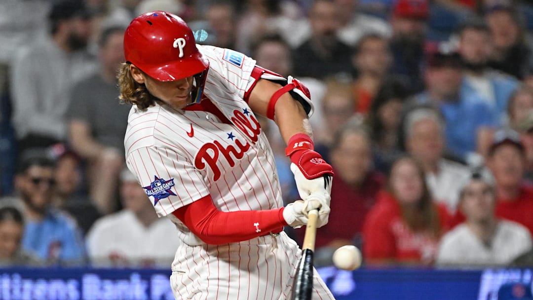 Apr 13, 2026; Philadelphia, Pennsylvania, USA; Philadelphia Phillies third baseman Alec Bohm (28) hits an RBI single against the Chicago Cubs during the fifth inning at Citizens Bank Park. Mandatory Credit: Eric Hartline-Imagn Images