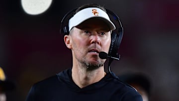 Nov 7, 2025; Los Angeles, California, USA; Southern California Trojans head coach Lincoln Riley watches game action against the Northwestern Wildcats during the second half at the Los Angeles Memorial Coliseum. Mandatory Credit: Gary A. Vasquez-Imagn Images