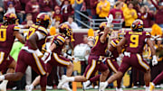 Sep 6, 2025; Minneapolis, Minnesota, USA; Minnesota Golden Gophers defensive back John Nestor (17) celebrates as he returns an interception for a touchdown against the Northwestern State Demons during the first quarter at Huntington Bank Stadium. Mandatory Credit: Matt Krohn-Imagn Images