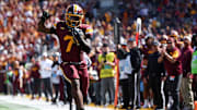 Sep 6, 2025; Minneapolis, Minnesota, USA; Minnesota Golden Gophers wide receiver Legend Lyons (7) runs for a touchdown against the Northwestern State Demons during the second quarter at Huntington Bank Stadium. Mandatory Credit: Matt Krohn-Imagn Images