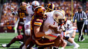 Sep 6, 2025; Minneapolis, Minnesota, USA; Minnesota Golden Gophers defensive lineman Karter Menz (11) tackles Northwestern State Demons running back Kolbe Burrell (3) during the second quarter at Huntington Bank Stadium. Mandatory Credit: Matt Krohn-Imagn Images