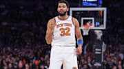 Dec 3, 2025; New York, New York, USA;  New York Knicks center Karl-Anthony Towns (32) reacts after scoring in the third quarter against the Charlotte Hornets at Madison Square Garden. Mandatory Credit: Wendell Cruz-Imagn Images