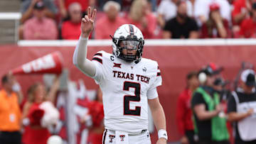 Sep 20, 2025; Salt Lake City, Utah, USA; Texas Tech Red Raiders quarterback Behren Morton (2) signals to the sideline during the first quarter of the game against the Utah Utes at Rice-Eccles Stadium. Mandatory Credit: Rob Gray-Imagn Images